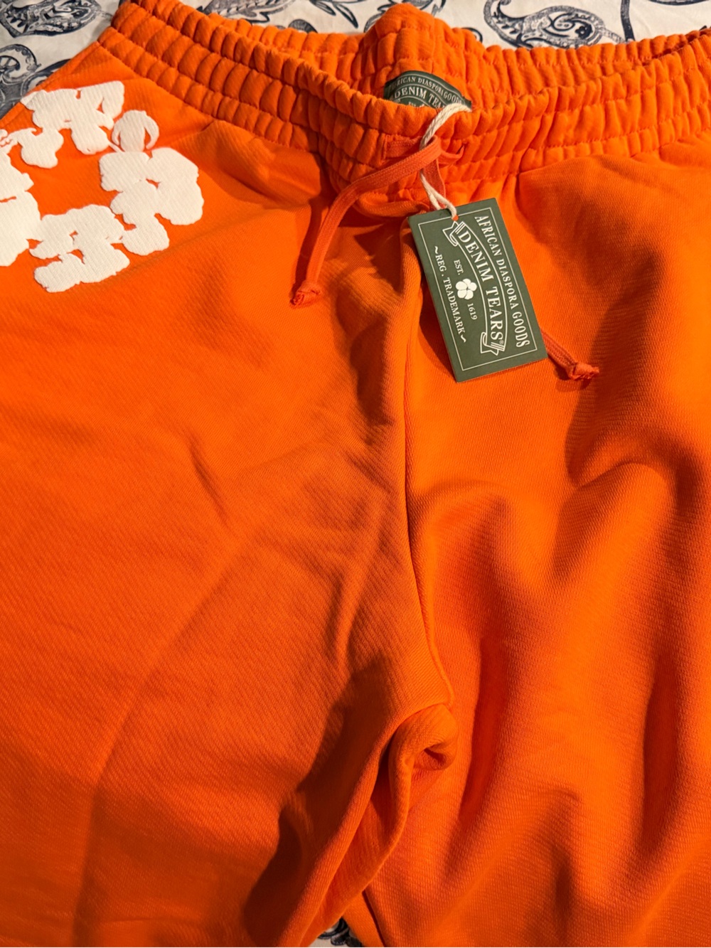 Brand New - Denim Tears.  Orange Floral Print Sweatpants